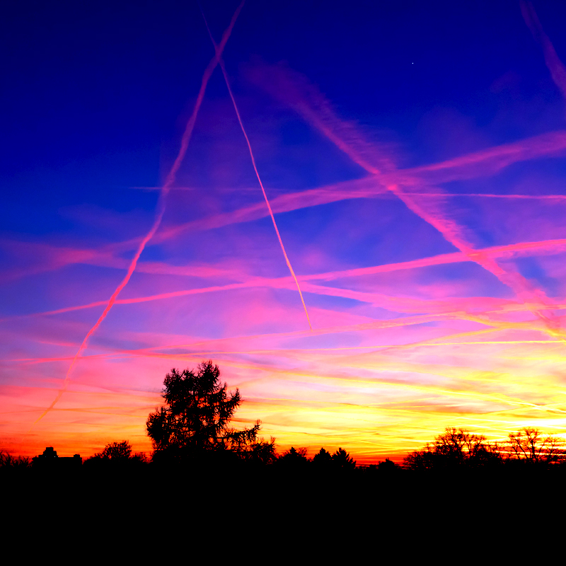 colorful contrails in sky